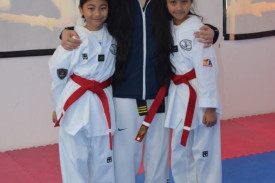 Proud Taekwondo Instructor and Students - Life long Lessons